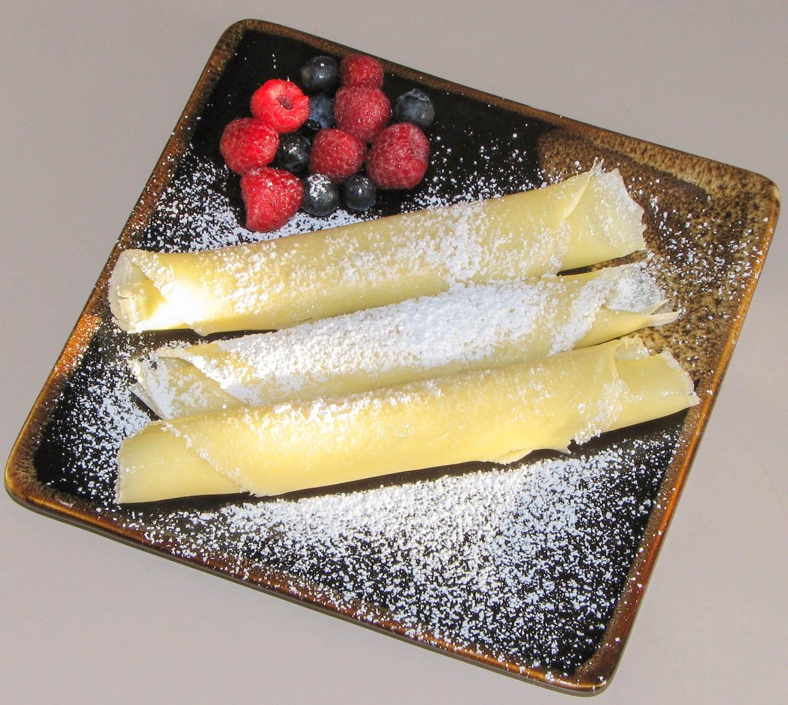 Crepes with Melted Butter and Powdered Sugar