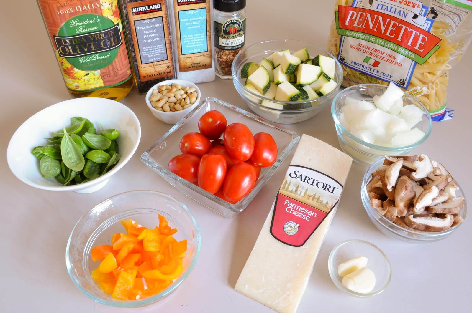 Penne with Mixed Vegetables, Parmesan Cheese, and Pine Nuts