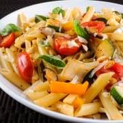 Penne with Mixed Vegetables, Parmesan Cheese, and Pine Nuts