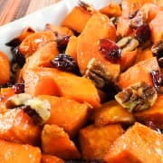Roasted Yams with Maple, Dried Cranberries, and Pecans