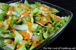 Butter Leaf Salad with Cerignola Olives, Shaved Parmesan, and Roasted Tomato Vinaigrette