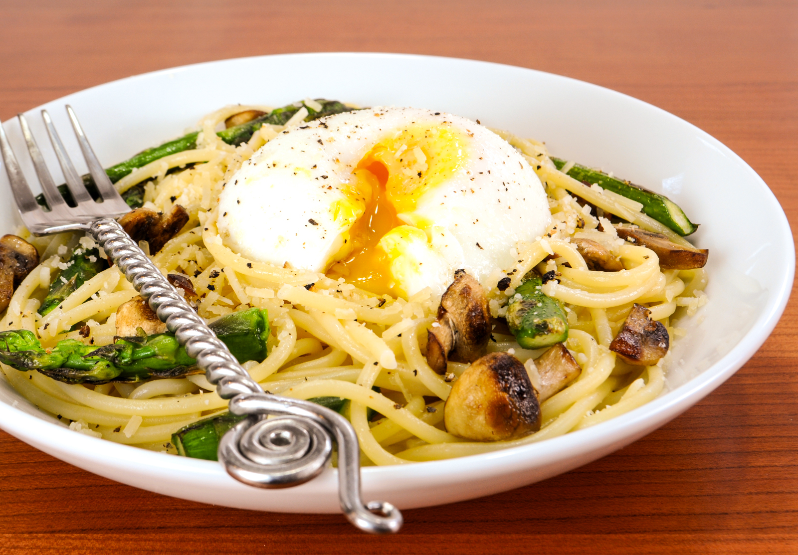 Spaghetti with Asparagus, Mushrooms, Parmesan, and a Poached Egg