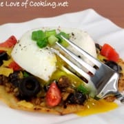 Mexican Tostada topped with a Poached Egg