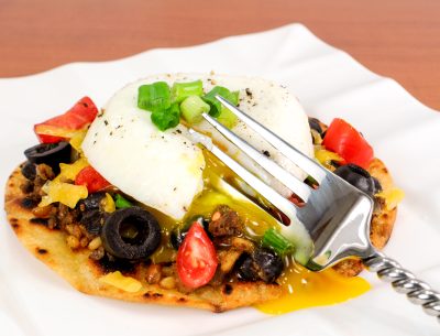 Mexican Tostada Topped with a Poached Egg