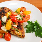 Garlic Basil Chicken topped with Caprese Salad