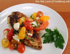 Garlic Basil Chicken topped with Caprese Salad