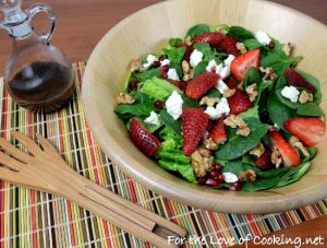 Spinach Salad with Strawberries, Candied Walnuts, Feta, and Pomegranate Seeds