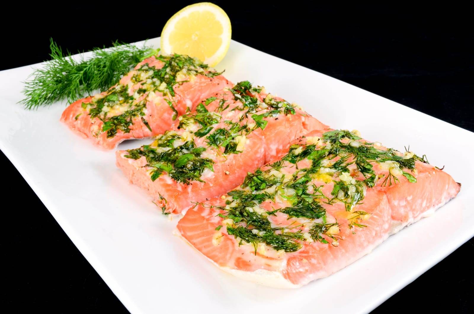 Slow Roasted Salmon with Garlic, Dill, Parsley, Tarragon, and Lemon