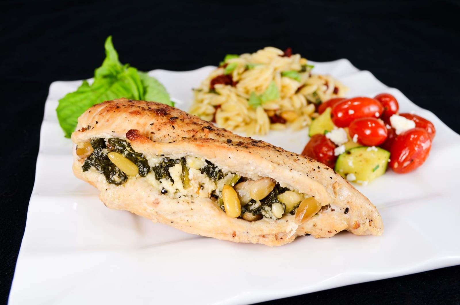 Chicken Stuffed with Spinach, Feta, and Pine Nuts