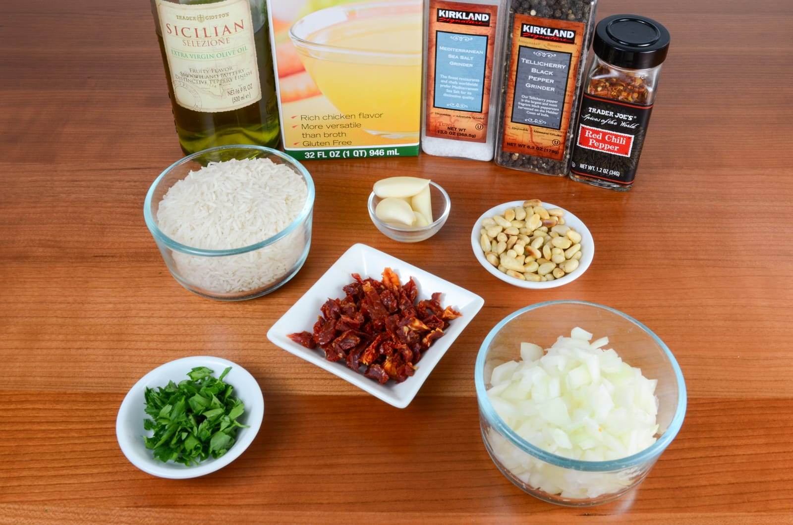 Garlic Rice with Sautéed Onions, Sun-Dried Tomatoes, and Toasted Pine Nuts