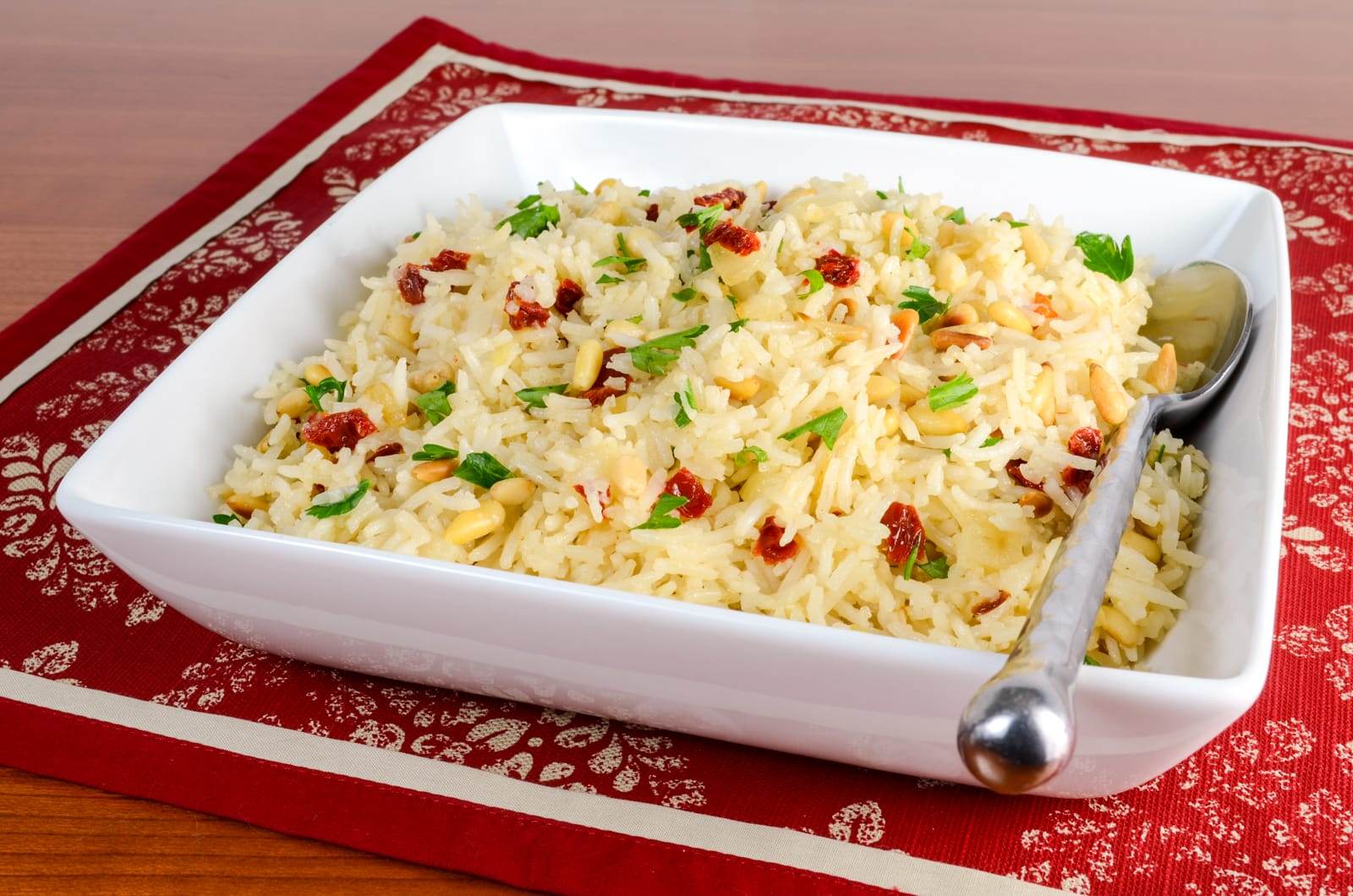 Garlic Rice with Sautéed Onions, Sun-Dried Tomatoes, and Toasted Pine Nuts