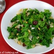 Sautéed Garlicky Kale with Onions, Pine Nuts, and Craisins