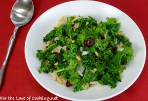 Sautéed Garlicky Kale with Onions, Pine Nuts, and Craisins