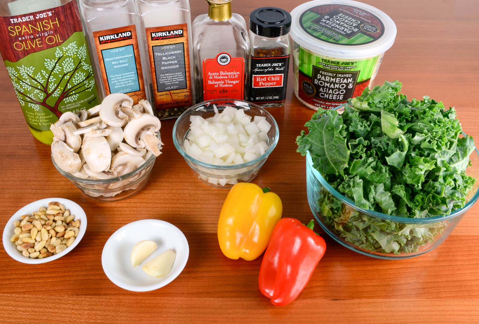 Warm Balsamic Kale, Mushroom, and Pepper Salad with Toasted Pine Nuts