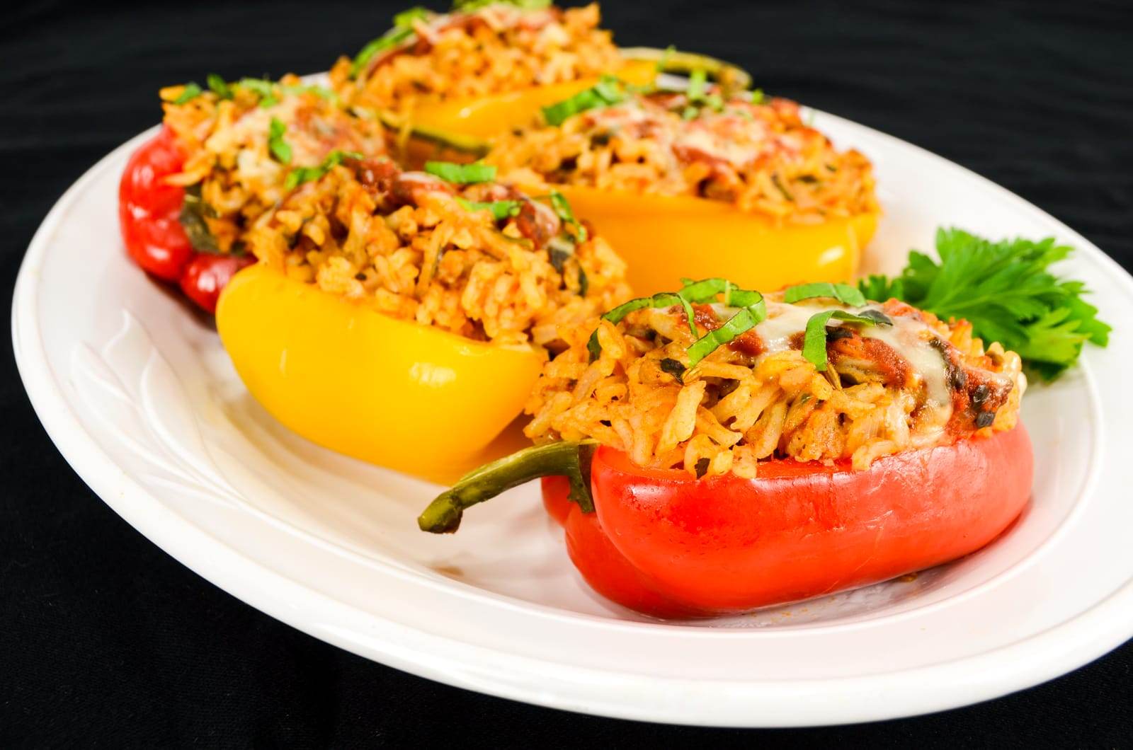 Stuffed Bell Peppers with Chicken Italian Sausage, Rice, and Spinach