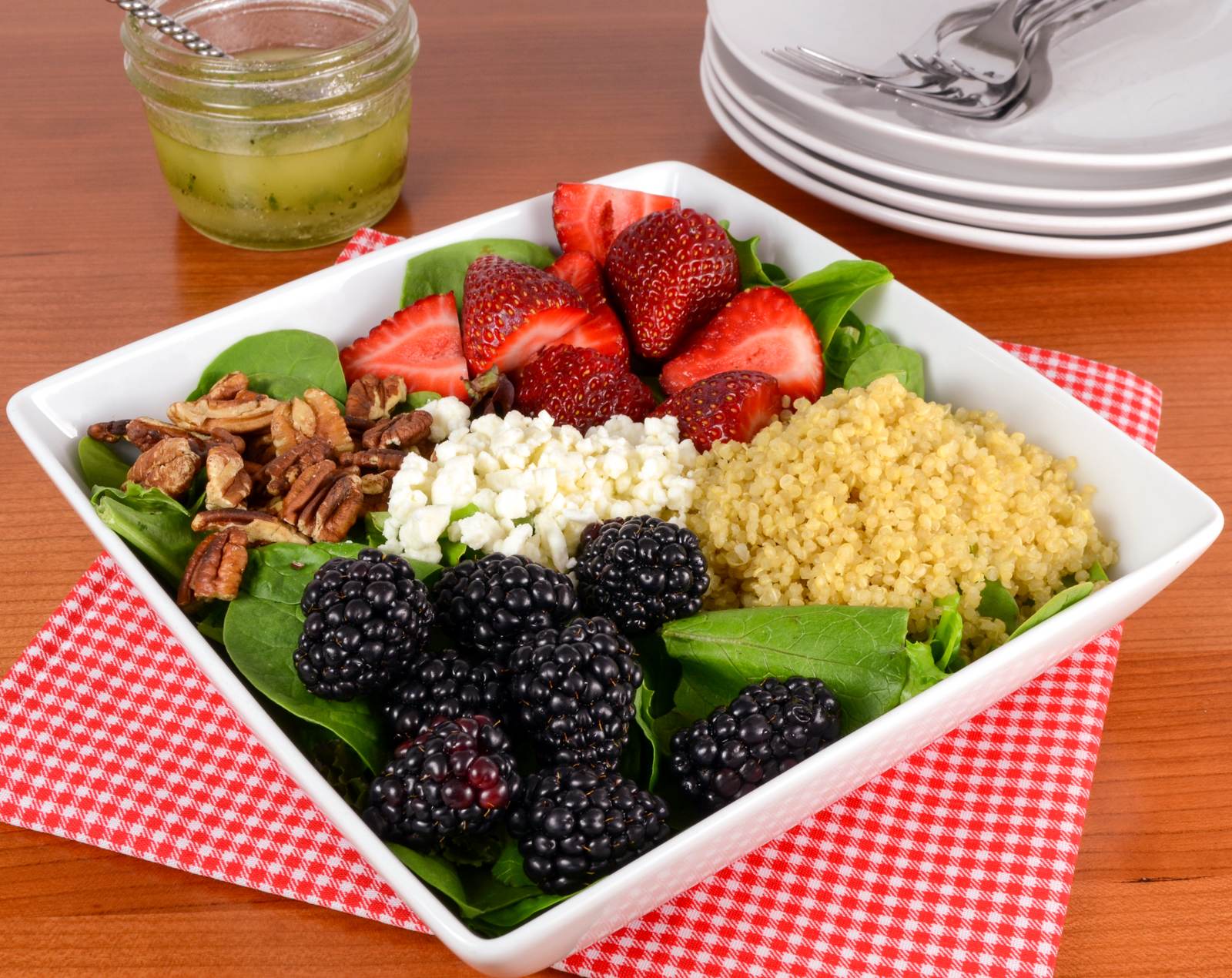 Berry Quinoa Spinach Salad with White Balsamic Basil Vinaigrette