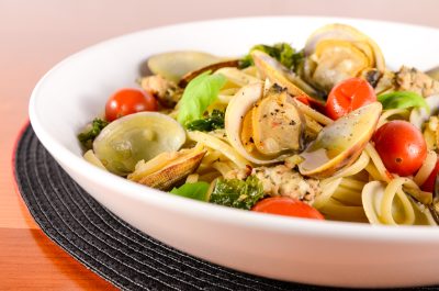 Linguine with Clams, Chicken Basil Sausage, Tomatoes, and Kale