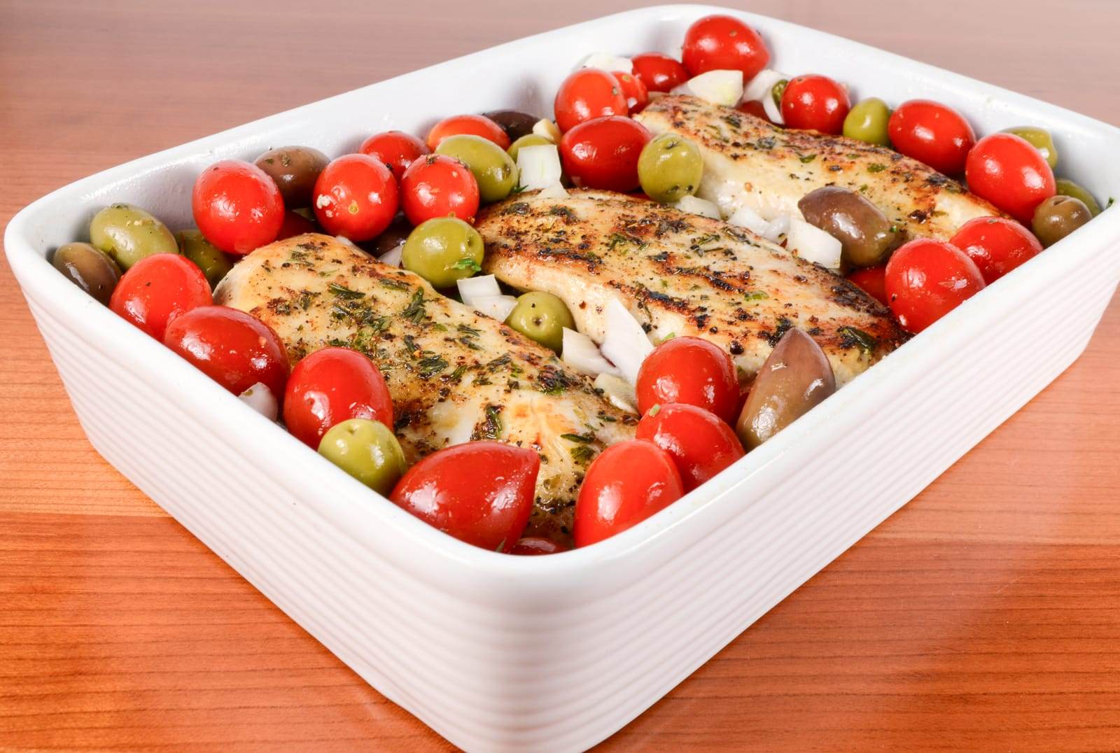 Baked Mediterranean Chicken Breasts with Tomatoes, Olives, Capers, and Garlic