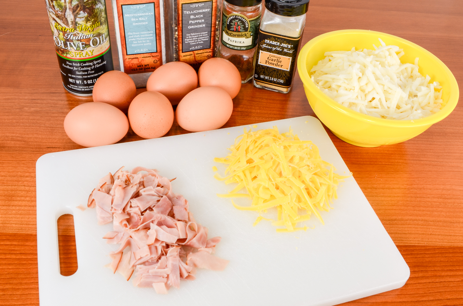 Hash Brown Nests with Egg, Ham, and Sharp Cheddar