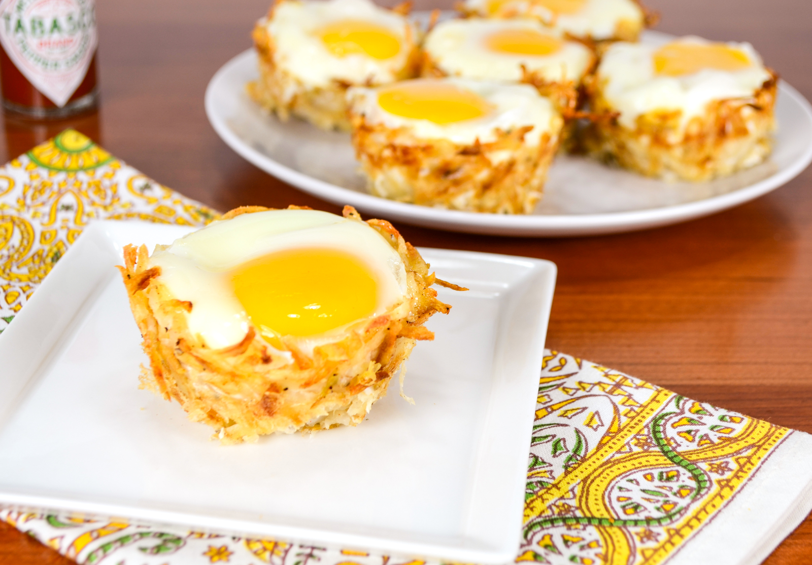Hash Brown Nests with Egg, Ham, and Sharp Cheddar