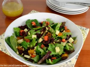 Roasted Carrot and Butternut Squash Salad with Mixed Greens, Extra Sharp Cheddar, and Pine Nuts