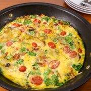 Baked Spanish Tortilla with Potato, Bacon, Onion, Mushroom, Tomato, Spinach, and Sharp Cheddar