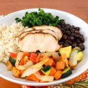 Rice Bowl with Spicy Chicken, Roasted Sweet Potatoes & Vegetables, Black Beans, and Kale