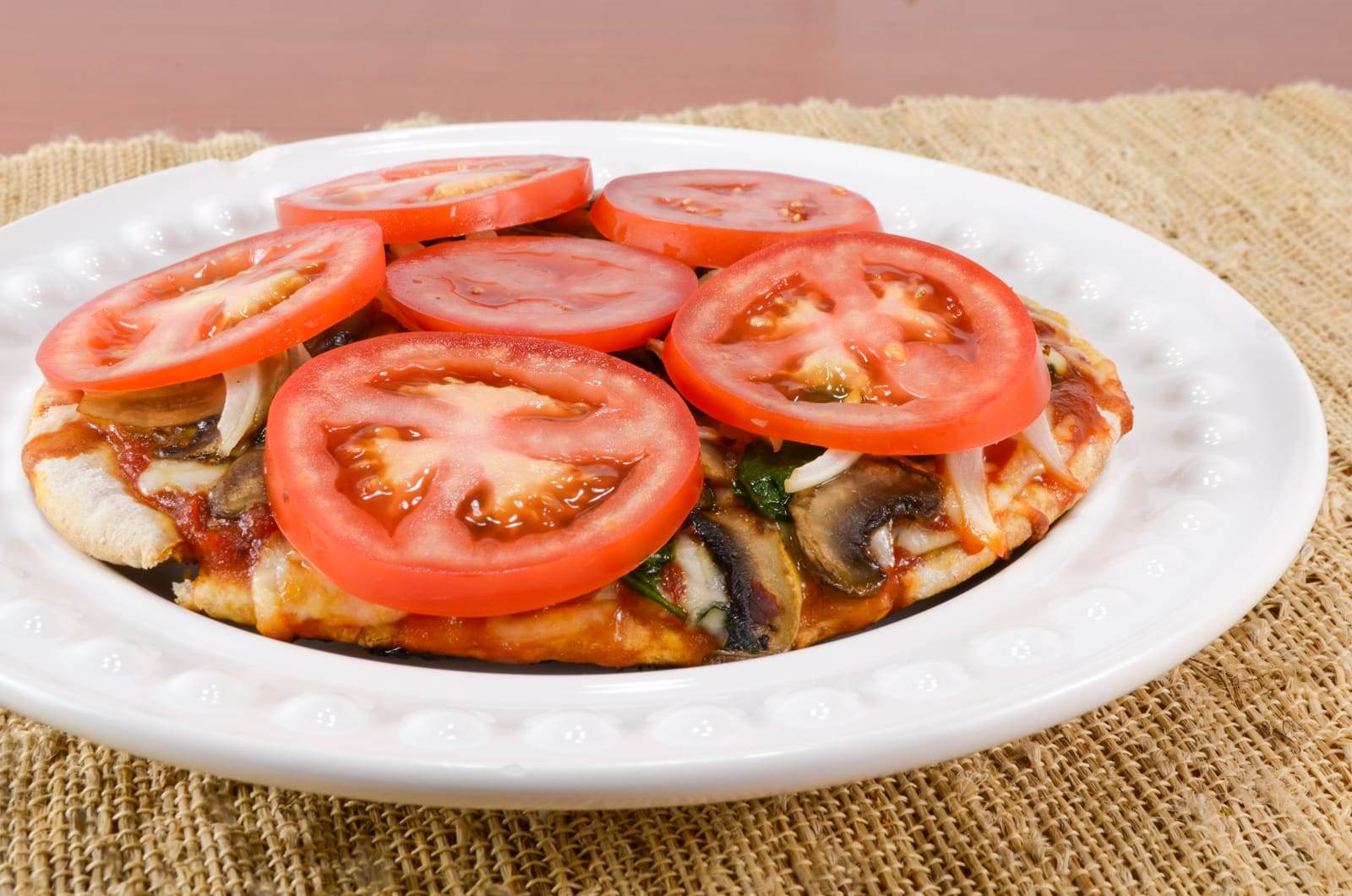 Pita Pizza with Spinach, Mushrooms, Onions, and Fresh Tomatoes