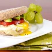 Breakfast Sandwich with Egg, Avocado, Tomato, and Swiss Cheese