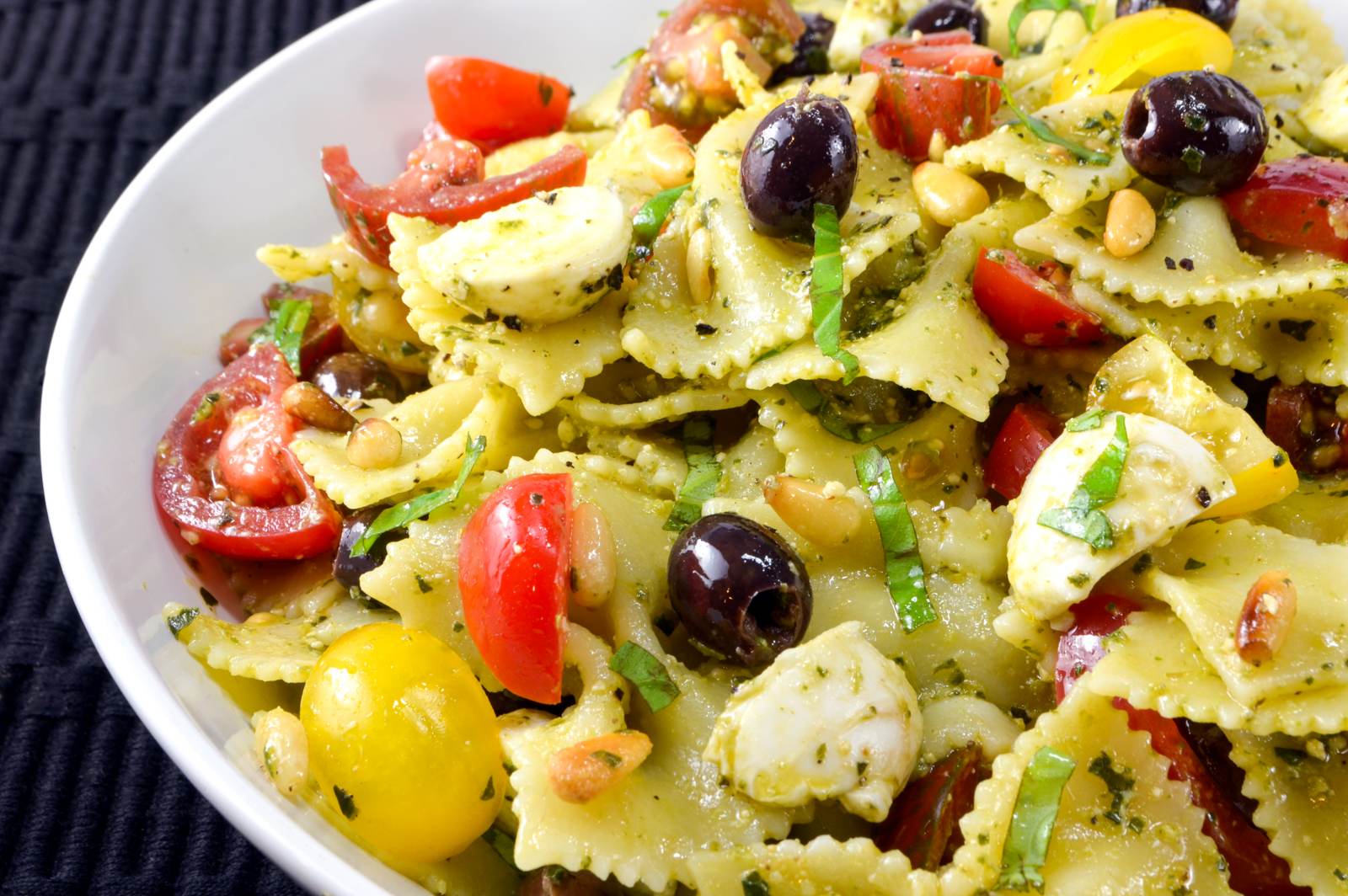 Pesto Pasta Salad with Heirloom Tomatoes, Mozzarella, and Olives