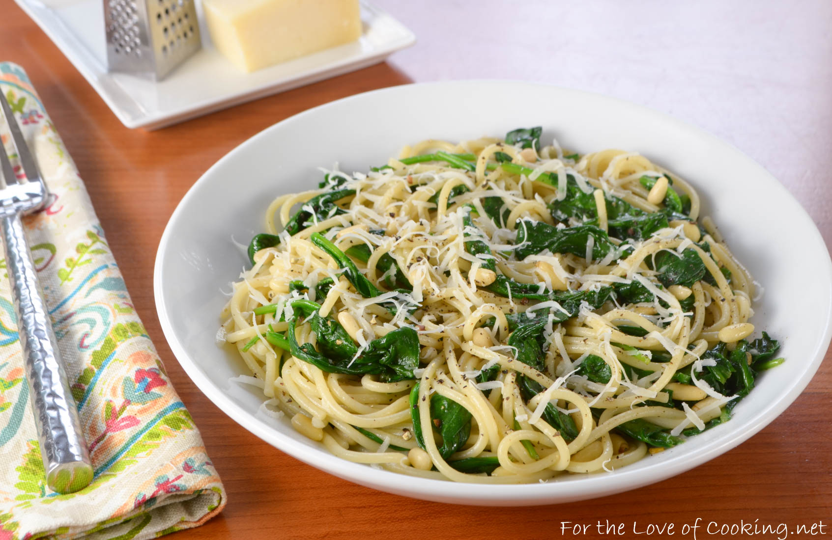 Spaghetti with Garlicky Spinach, Parmesan, and Toasted Pine Nuts