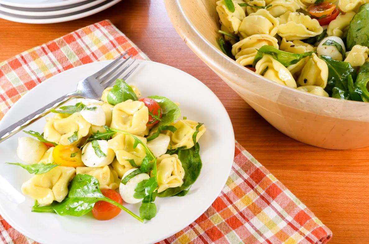 Cheese Tortellini Pasta Salad with Tomatoes, Arugula, and Mozzarella