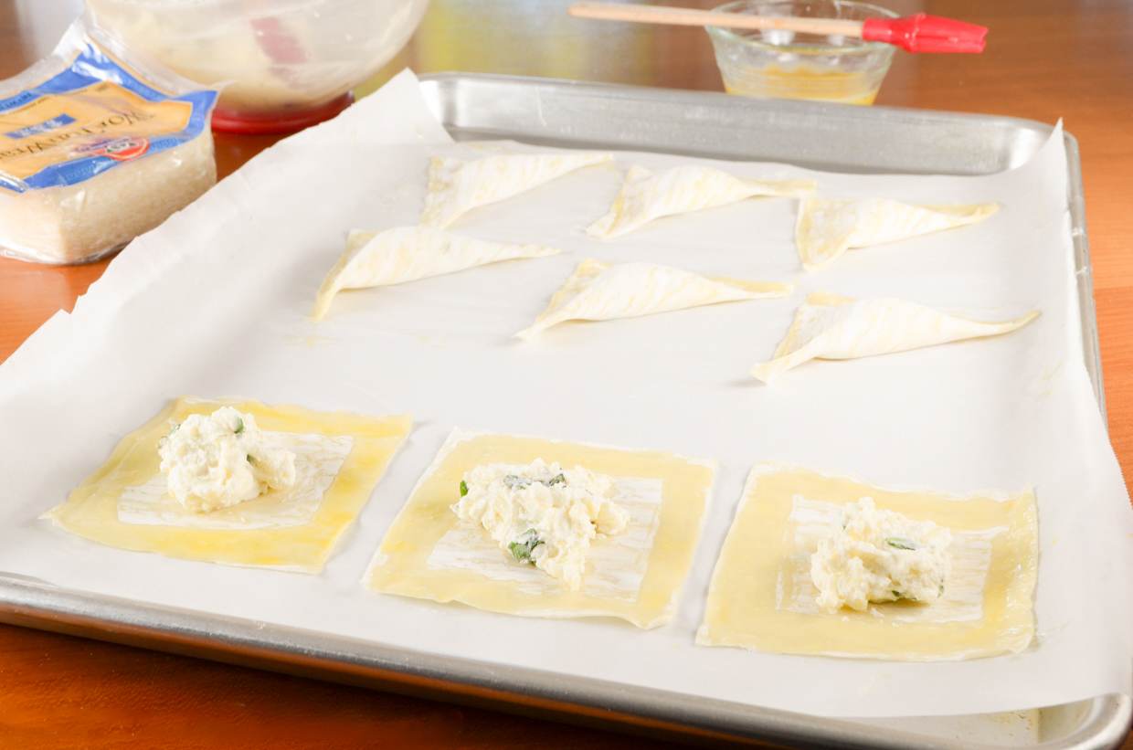 Basil-Ricotta Ravioli with Spinach and Blistered Tomatoes