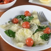 Basil-Ricotta Ravioli with Spinach and Blistered Tomatoes