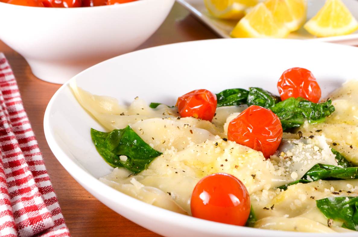 Basil-Ricotta Ravioli with Spinach and Blistered Tomatoes