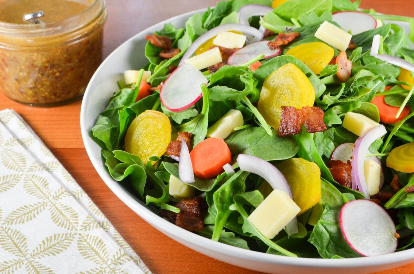 Irish Root Salad with Spinach, Sharp White Cheddar, and Bacon-Mustard Vinaigrette