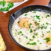 Skillet Baked Eggs with Cream and Parmesan