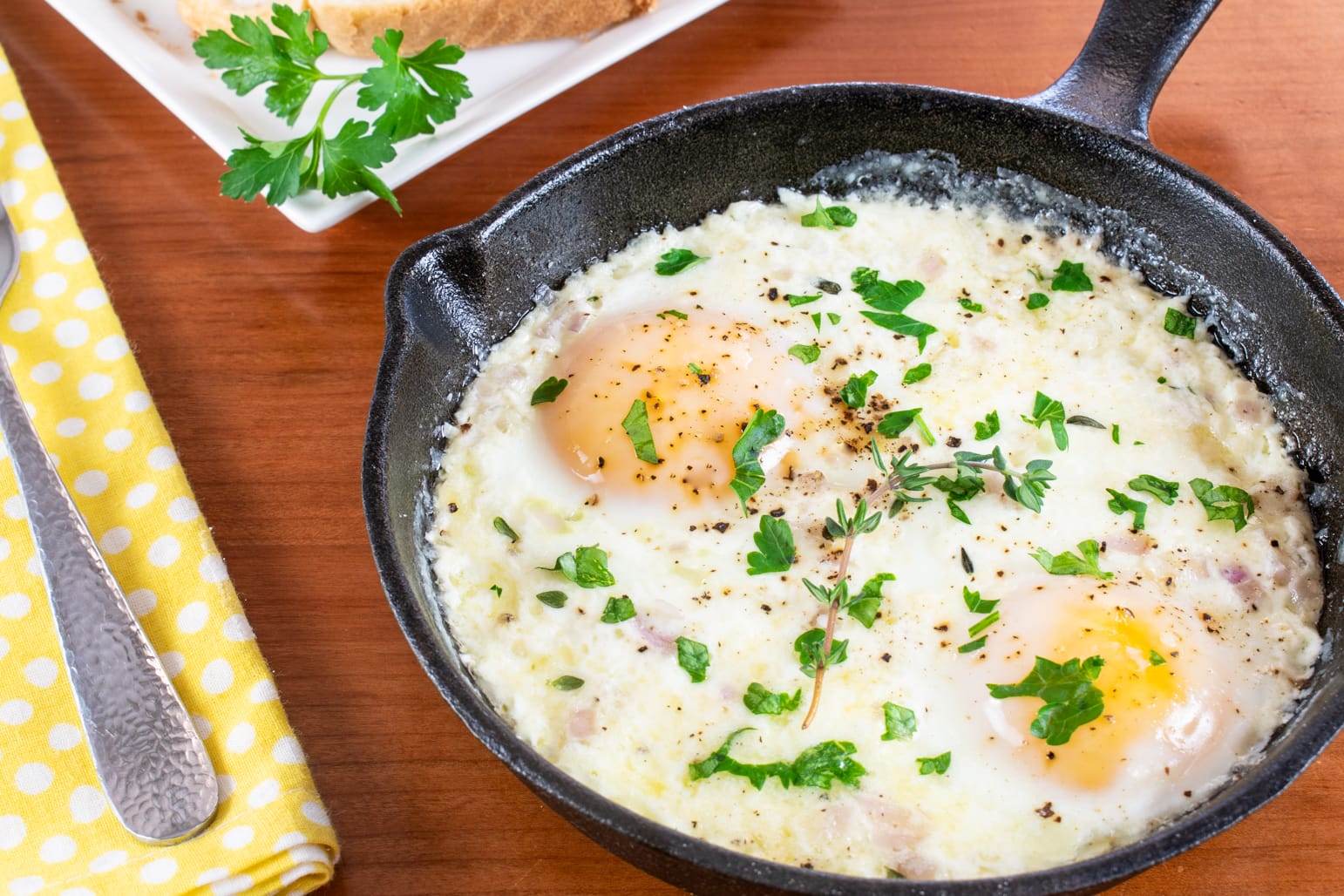 Skillet Baked Eggs with Cream and Parmesan