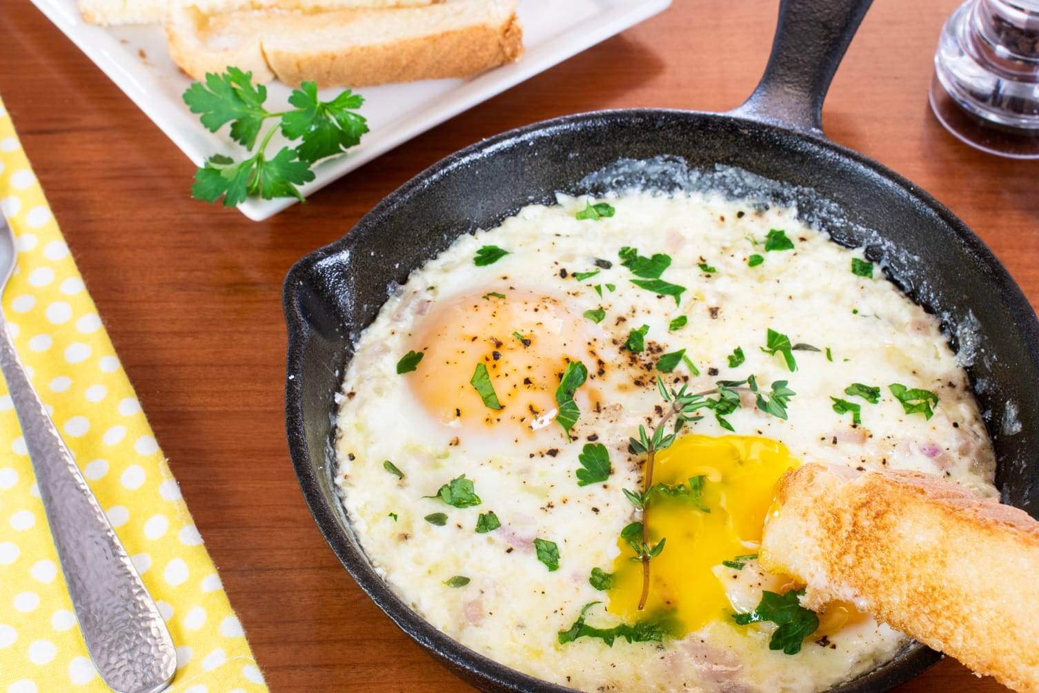 Skillet Baked Eggs with Cream and Parmesan