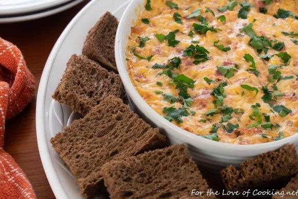 Reuben Dip with Dark Rye Crostini