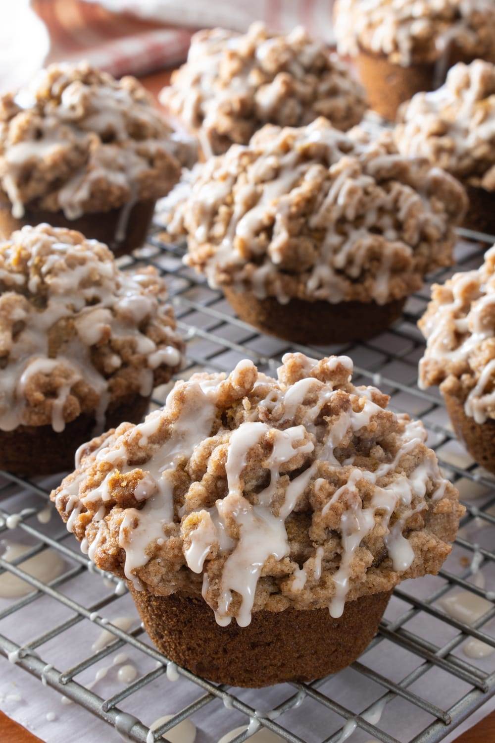 Pumpkin Crumb Cake Muffins with Maple Glaze