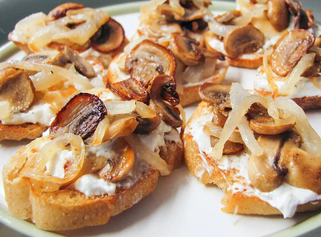 Caramelized Onion & Mushroom Crostini with Feta & Roasted Garlic Spread